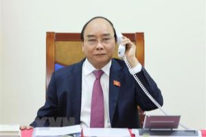 El  primer ministro de Vietnam sostiene una conversación telefónica con su homólogo de Laos