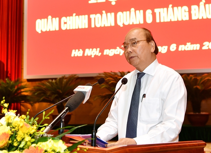 El primer ministro Nguyen Xuan Phuc interviene en la conferencia. (Foto: VGP)
