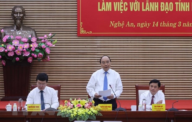 El primer ministro de Vietnam, Nguyen Xuan Phuc, en la reunión con autoridades de la provincia de Nghe An. (Foto: VNA).