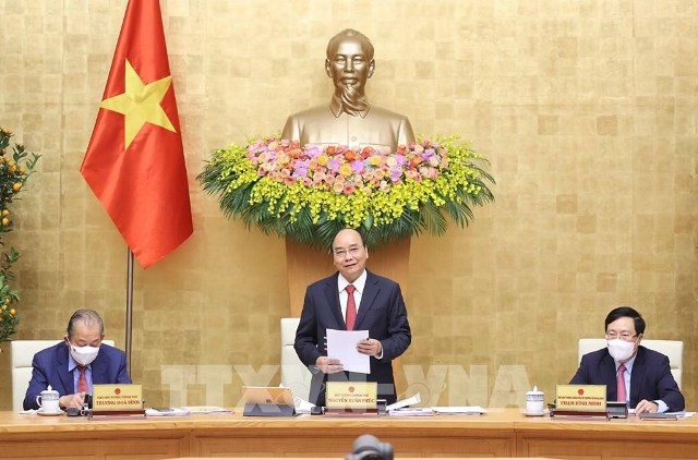 El primer ministro Nguyen Xuan Phuc preside la reunión. (Foto: VNA)