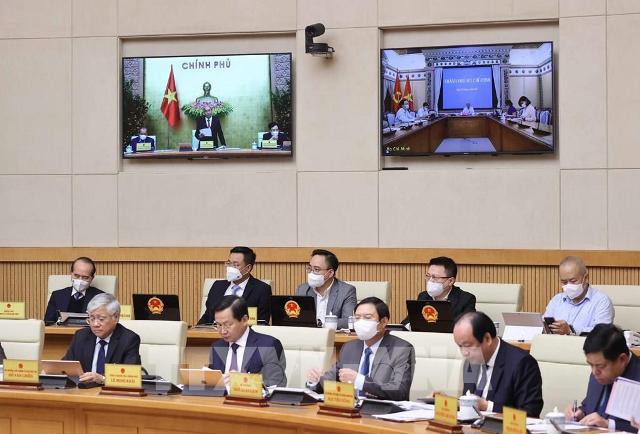 Delegados a la reunión virtual del Gobierno. (Foto: VNA)